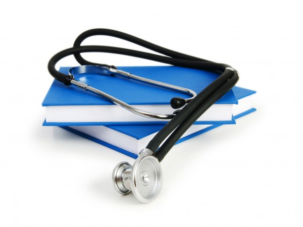 Concept of medical education with book and stethoscope